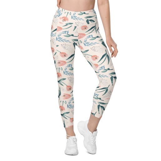 Floral print women's leggings with pastel pink and green design.