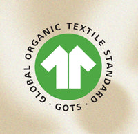 Global Organic Textile Standard (GOTS) logo on a beige background